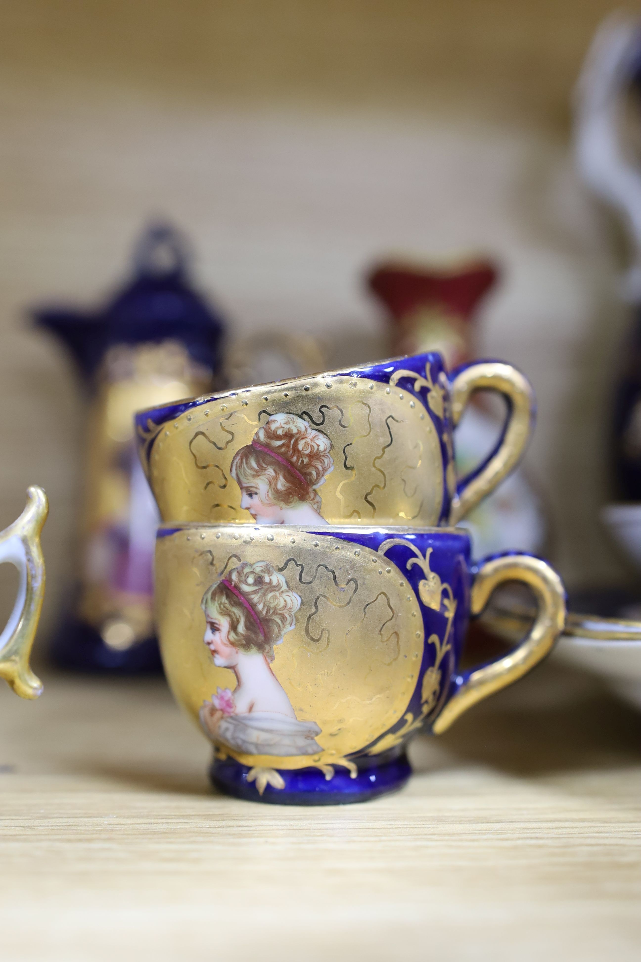 A selection of 19th century porcelain including Meissen cups, covers and saucers, Newhall type bowls and saucers and others